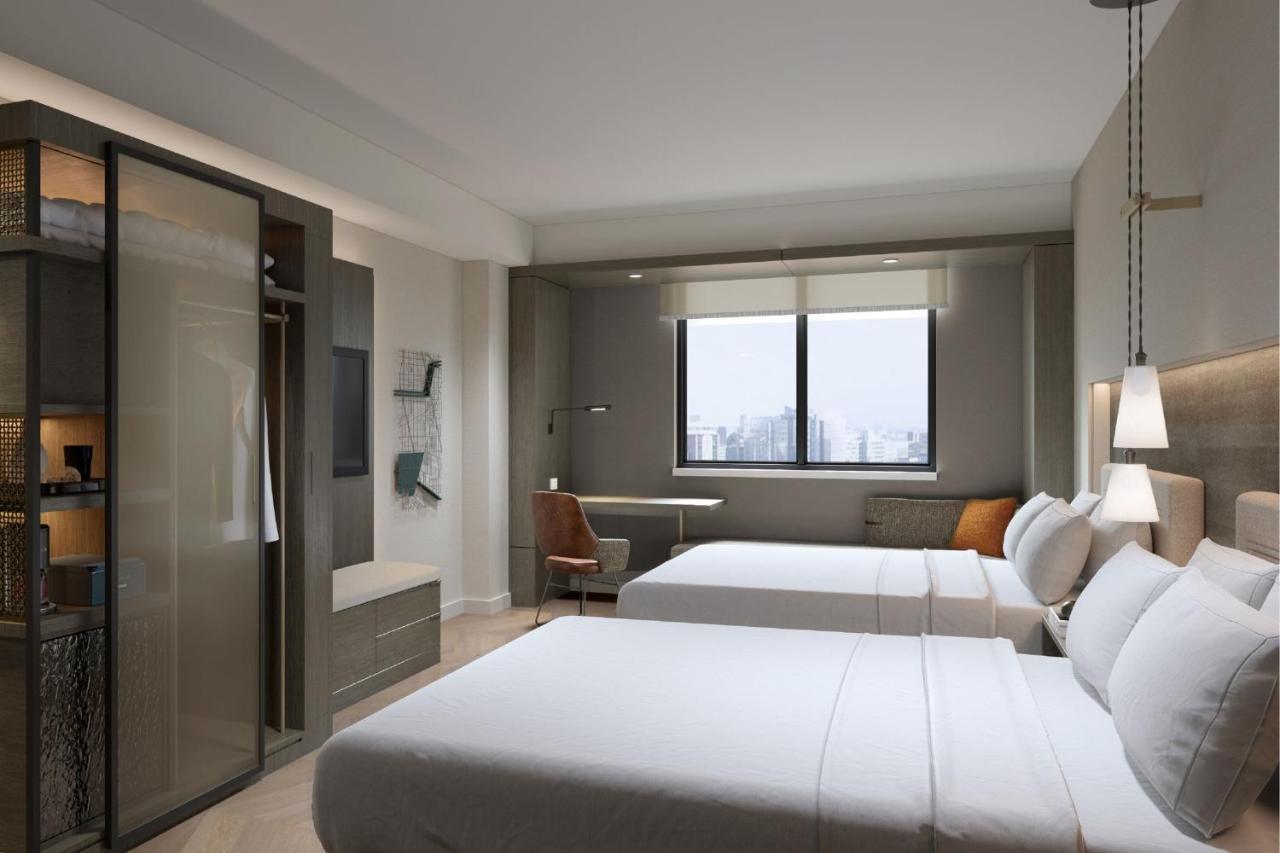 Kamer met 2 Queensize Bedden