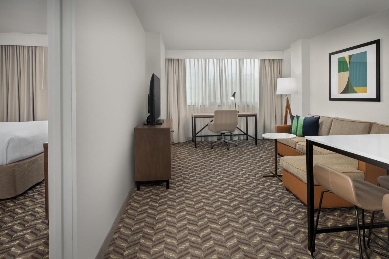 One-Bedroom Queen Suite Sofa Bed Mobility or Hearing Accessible Roll Shower