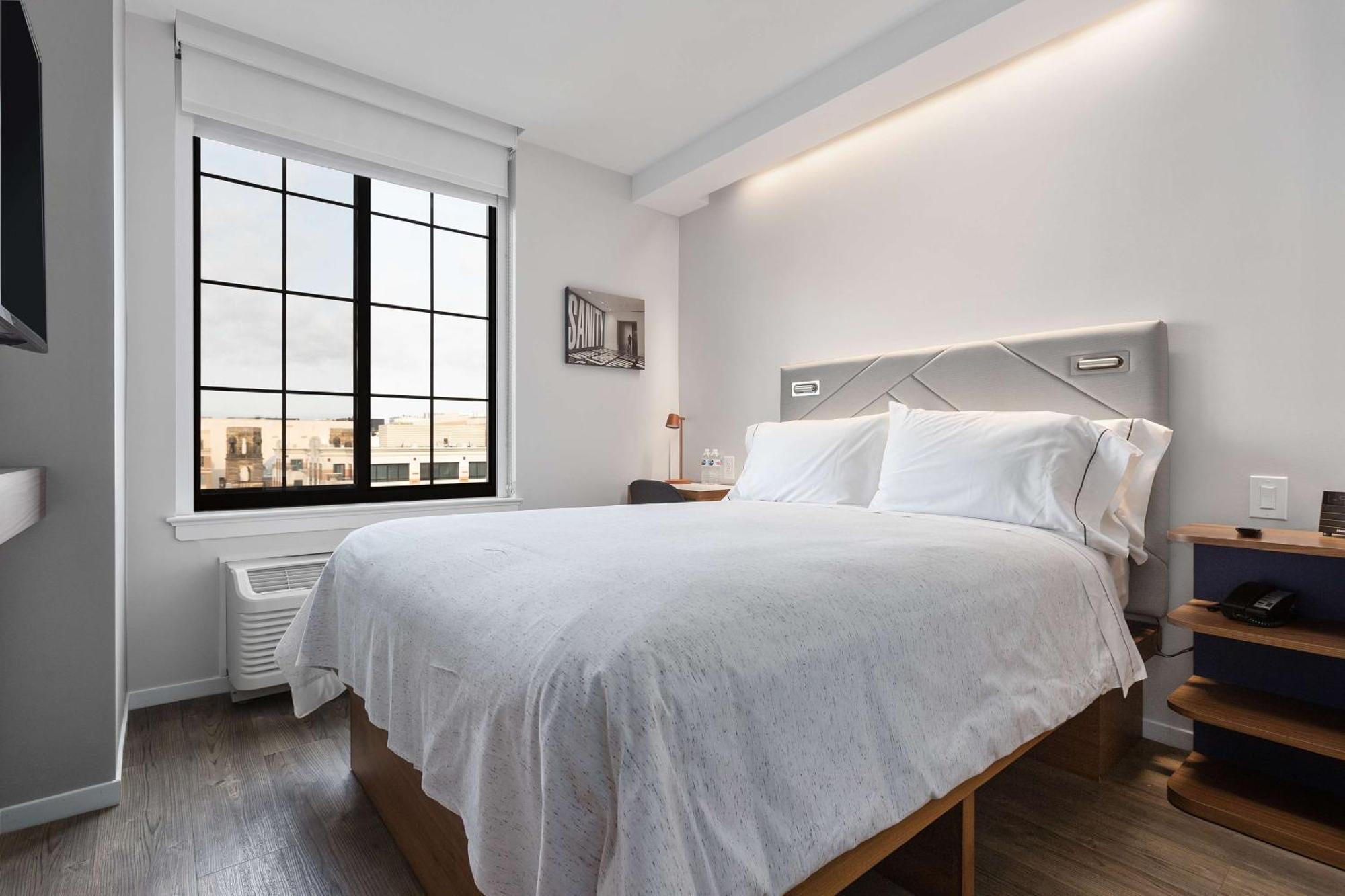 Compact Room One Full Bed